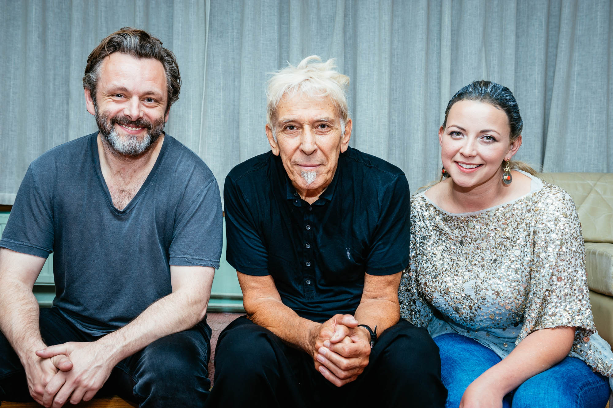A photo of John Cale (centre) at Festival of Voice with Michael Sheen and Charlotte Church