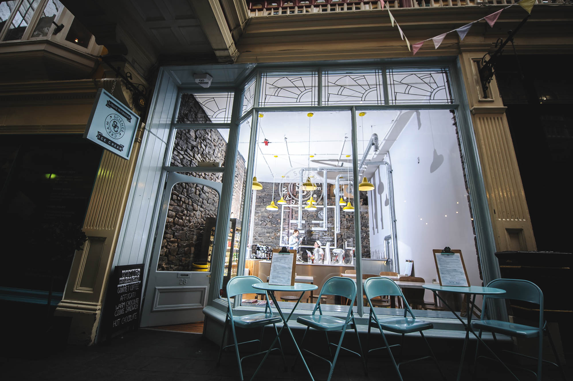 A photo of a shopfront in an arcade